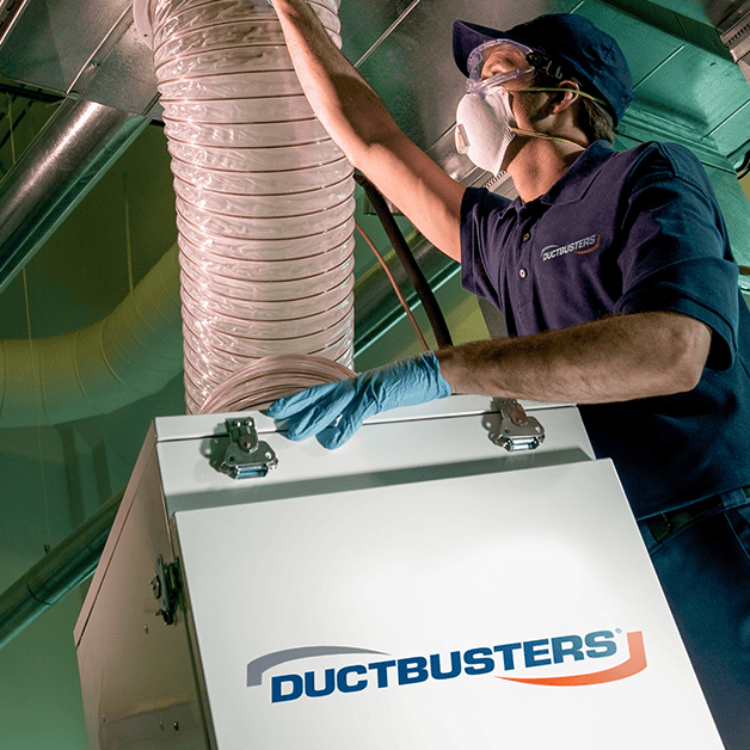 Technician performing HVAC restoration