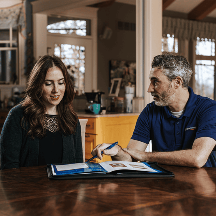 Air duct sealing technician and customer